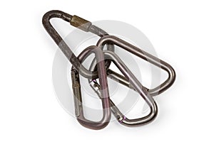 Several oval non-lockingÃ¢â¬â¹ carabiners on one triangular locking carabiner photo